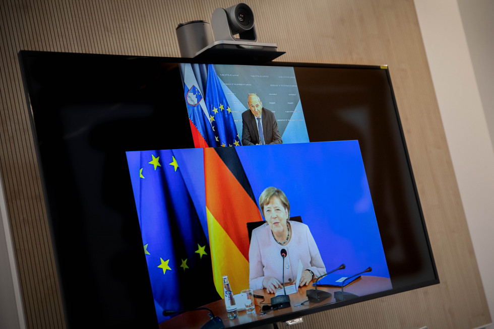 Prime Minister Janez Janša package with German Chancellor Angela Merkel