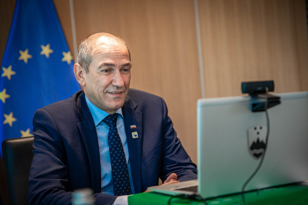 Prime Minister Janez Janša with a lap top in front of him.