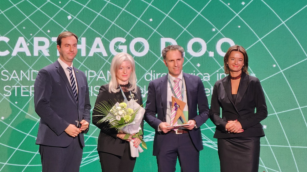 Award recipients with flowers