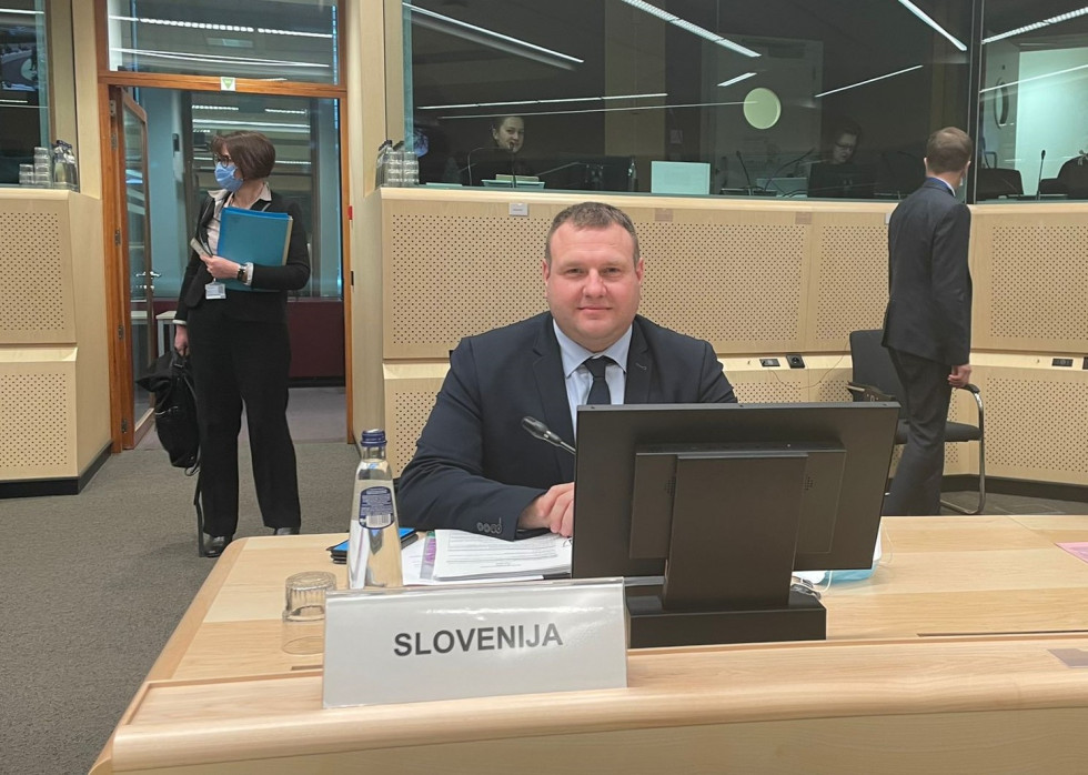 State Secretary Aleš Irgolič sitting at his table.
