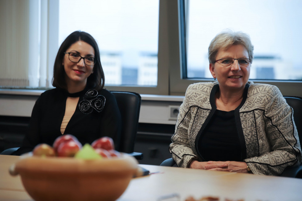 Ministers Šinko and Stojmenova Duh are sitting at the table listening. 