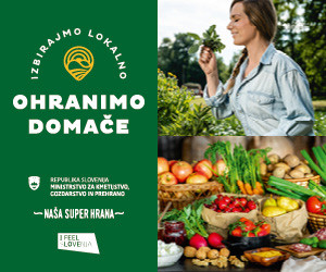 Napis ohranimo domače, miza s hrano in ženska, ki vonja začimbe