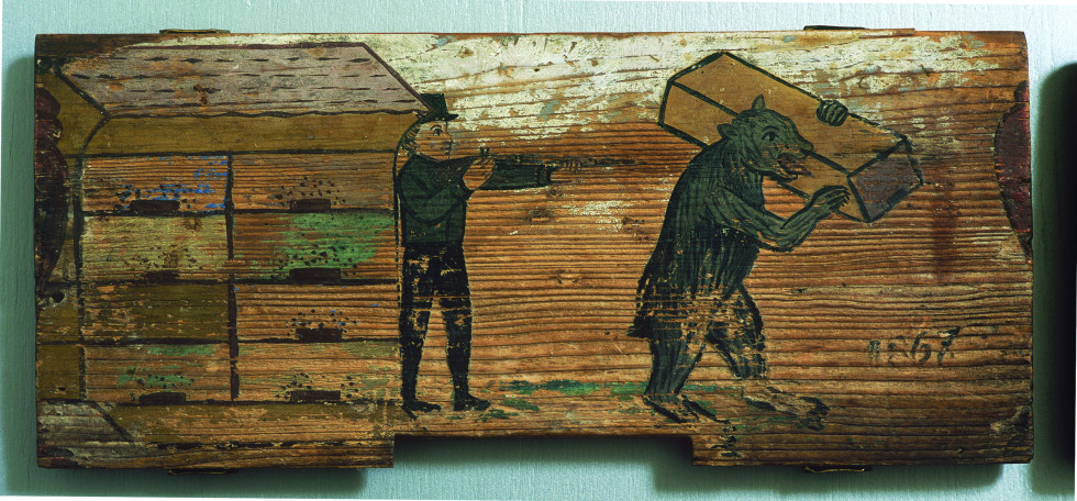 Men and bear during beekeeping