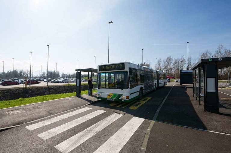 Ljubljana Passenger Transport bus at a bus stop.