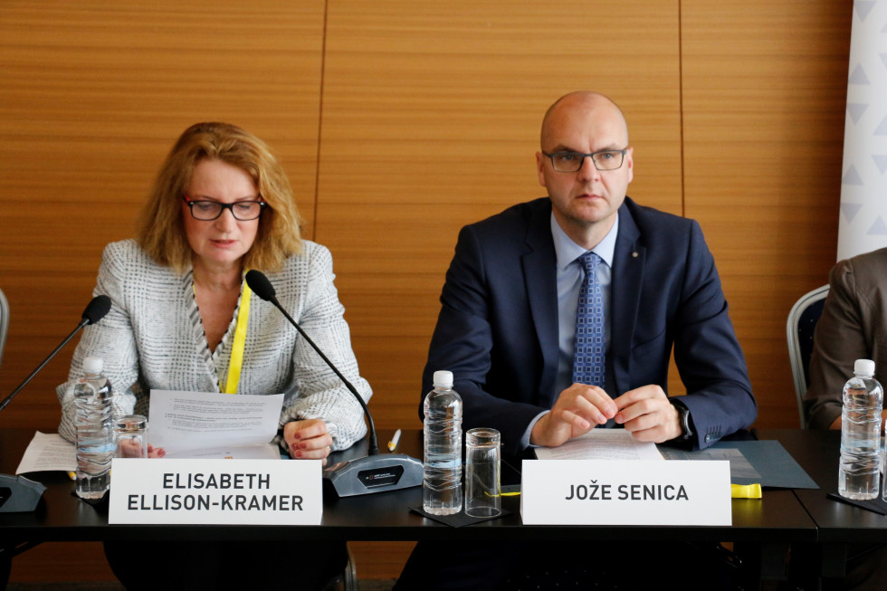 Austrian Ambassador to Slovenia Elisabeth Ellison Kramer and Assistant Director General of the Police Jože Senica, sitting at the table