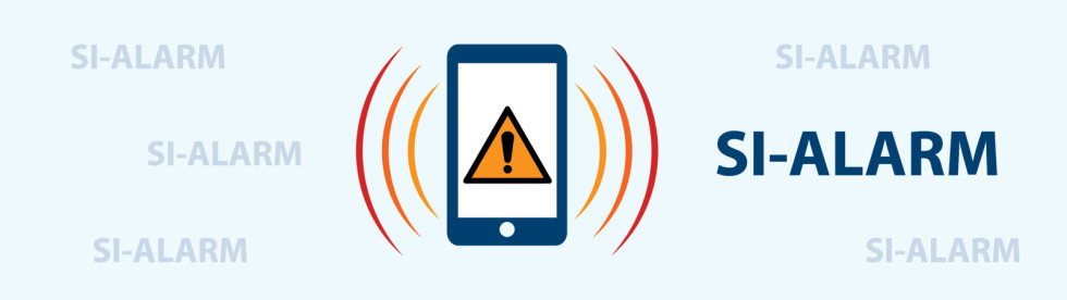 Mobilni telefon, na katerem je rumen trikotni opozorilni znak s klicajem. Zraven napis: SI-ALARM