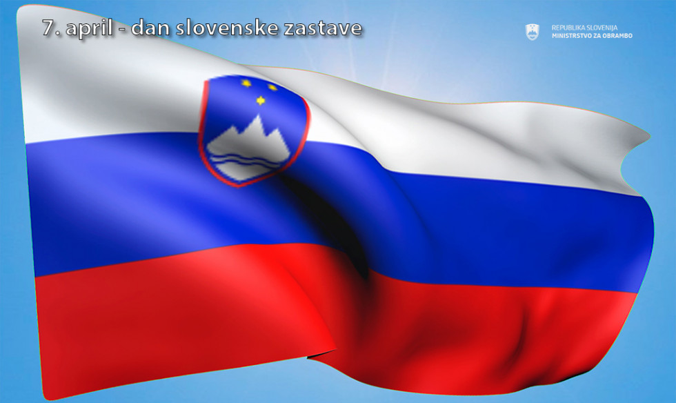 Slovenska zastava, nad njo napis 7. april dan slovenske zastave