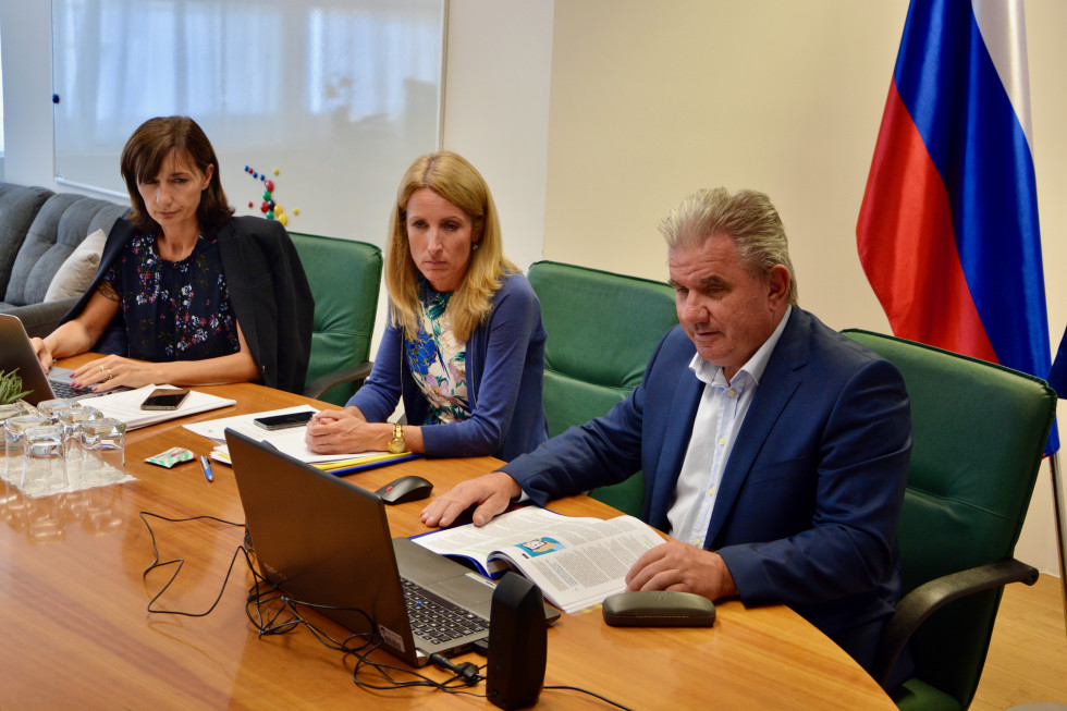 Minister Vizjak at a videoconference