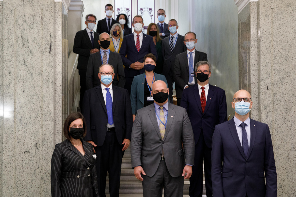 Family photo of Senior officials on the staircase