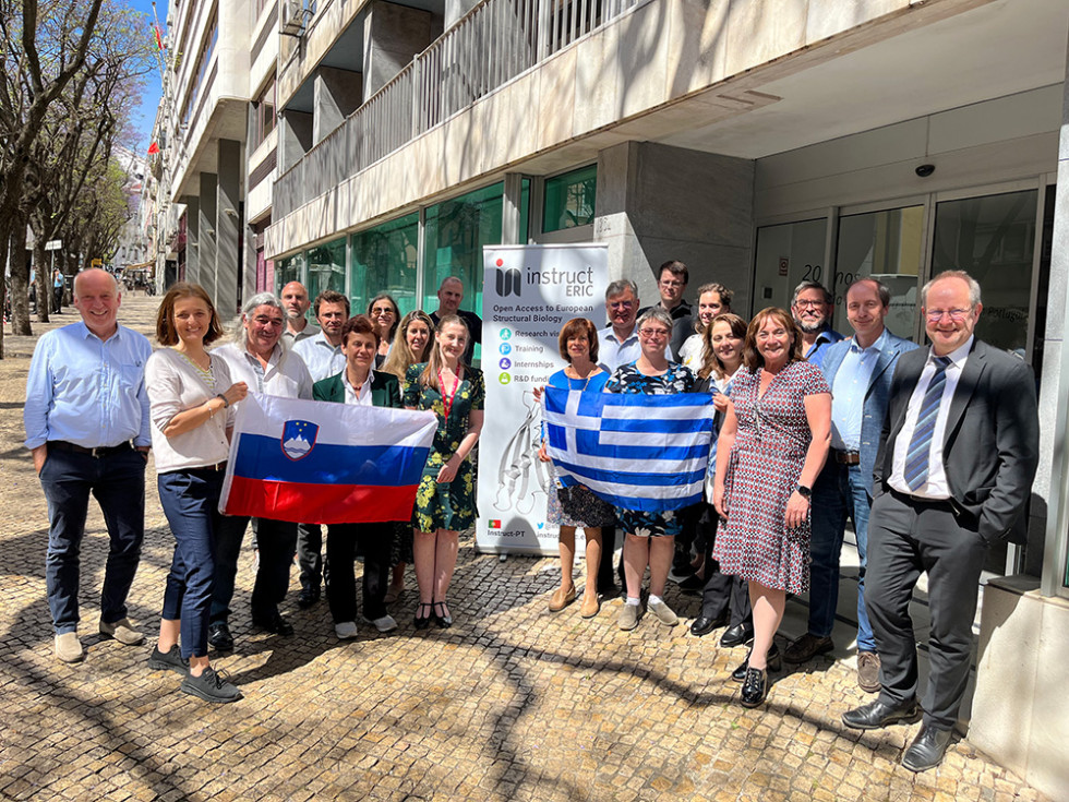 Representatives of Slovenia and Greece in a group photo upon admission to the Instruct-ERIC consortium