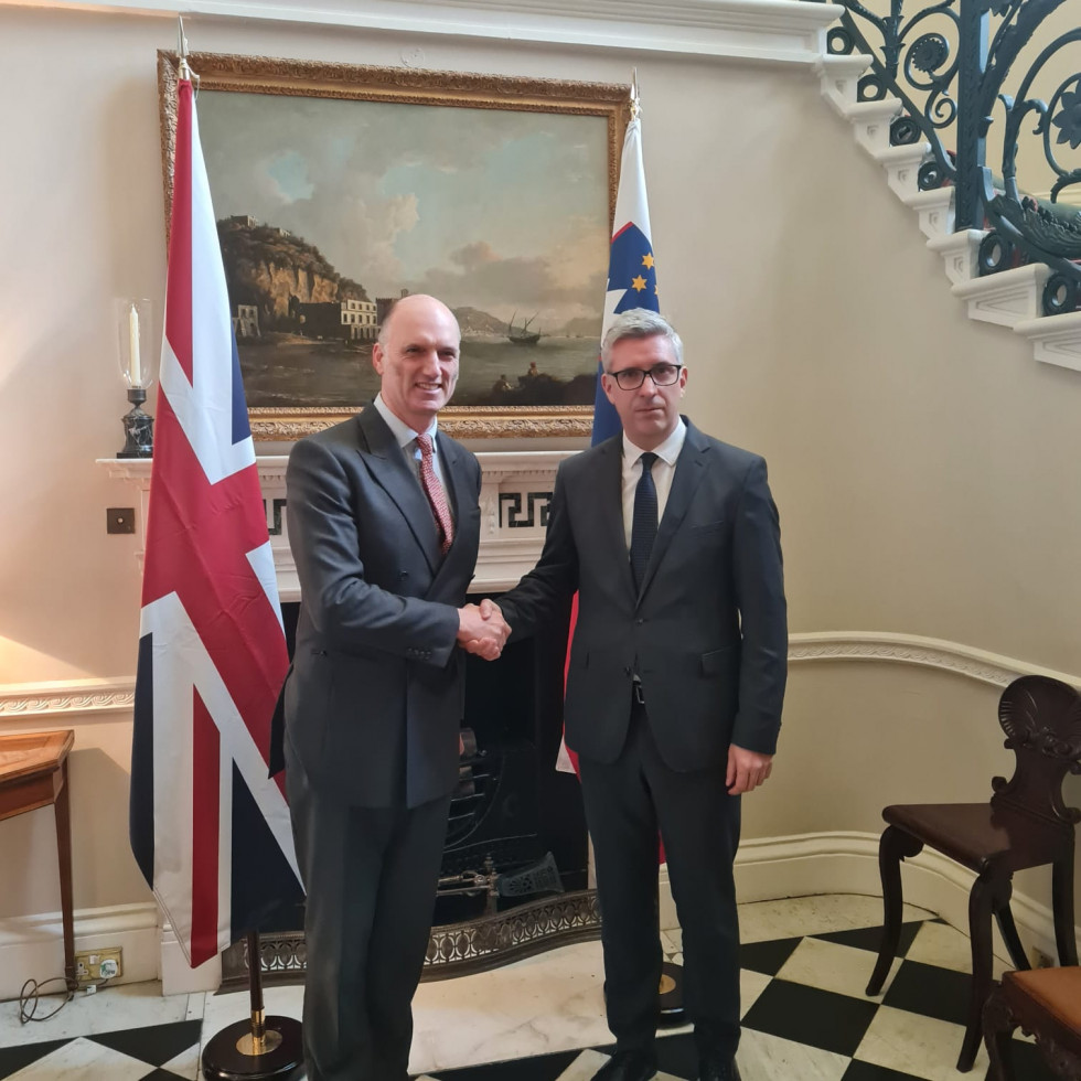 State Secretary Marko Štucin shaking hands with Leo Docherty, Parliamentary Under Secretary of State for Europe at the UK Foreign, Commonwealth & Development Office