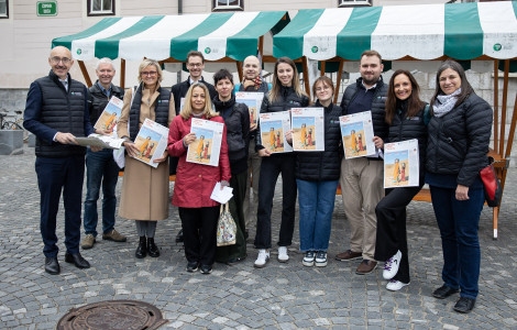 20241016 01384815 (Family photo, with newspaper )