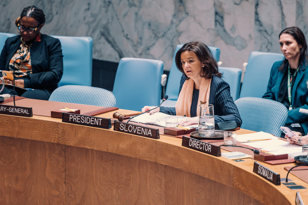 minister sitting in the table