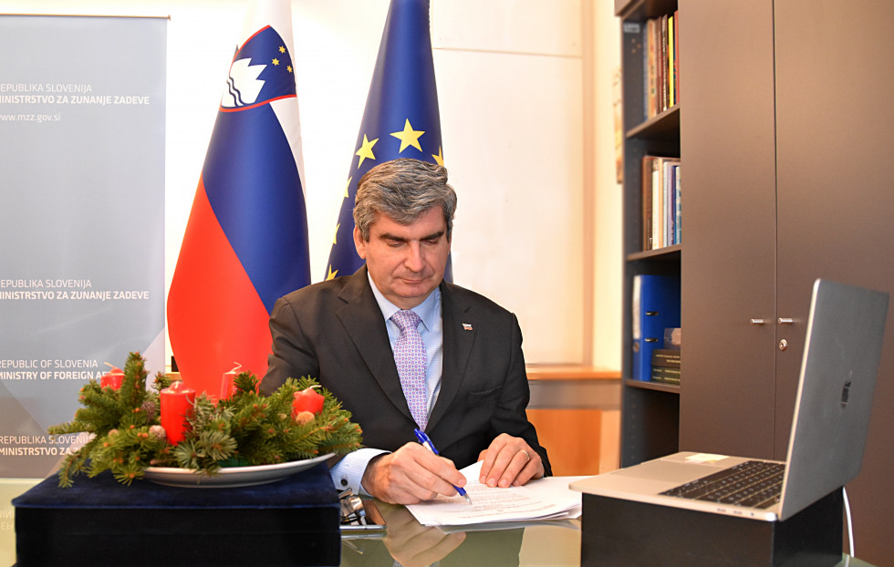 state secretary stanislav raščan in front of computer