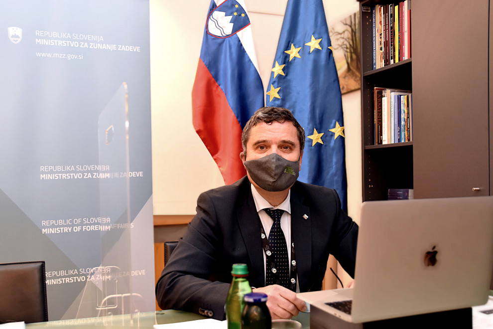  during a ministerial meeting in front of a computer