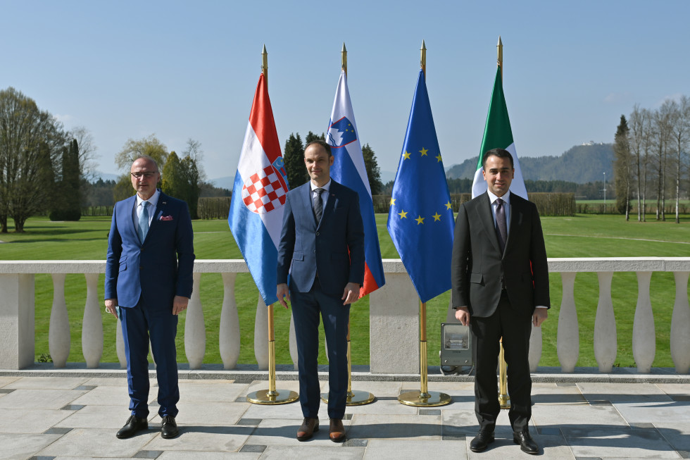 Ministers stand by the flags