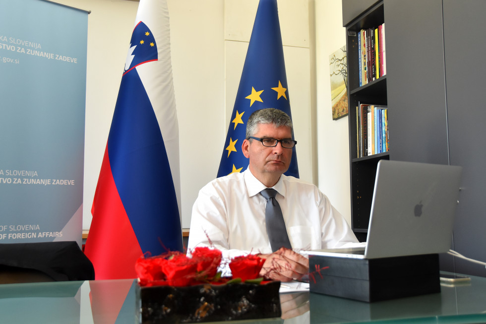 with computer, flags behind
