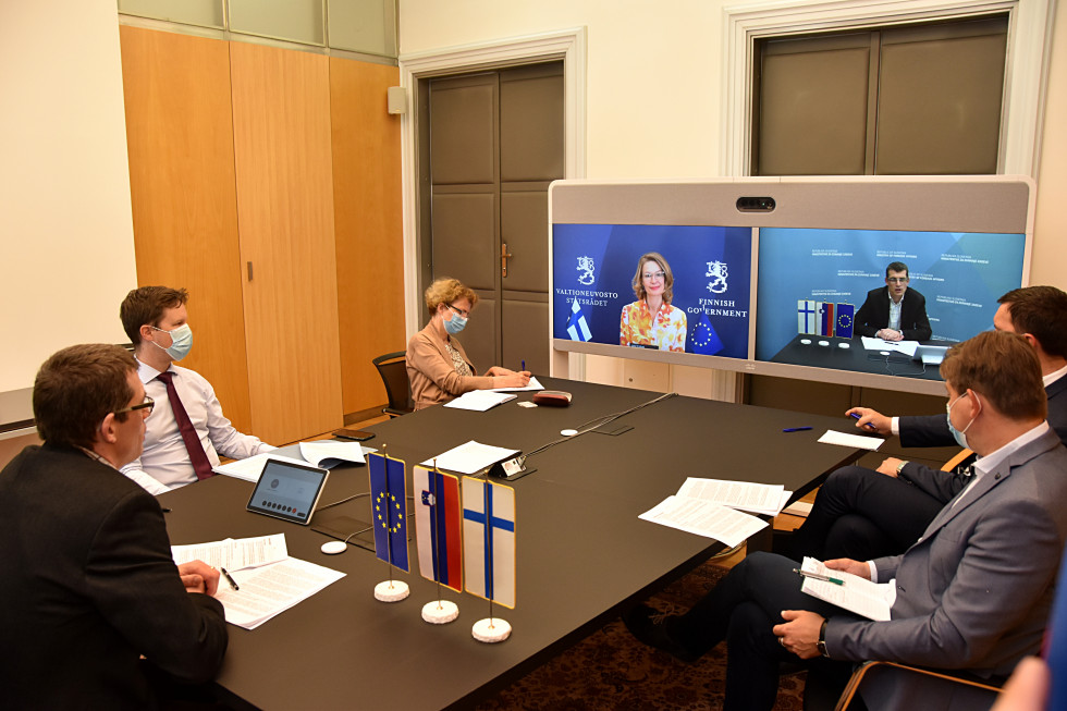 participants at a table with computer screen