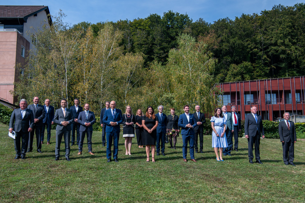 government's representatives standing on the grass