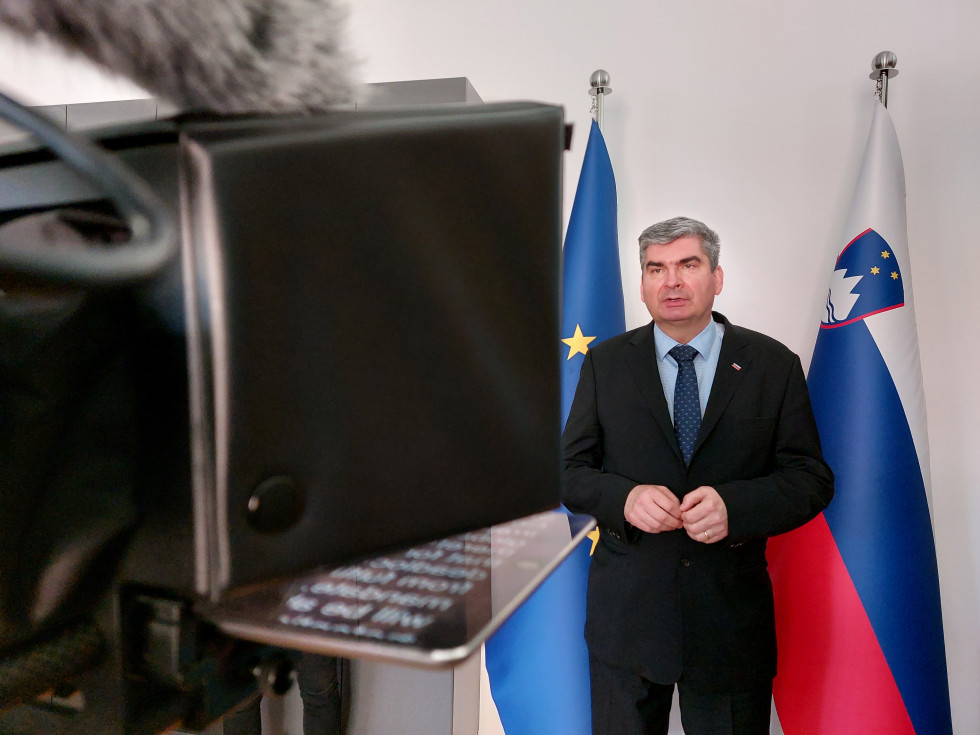 state secretary standing infront of camera, speaking