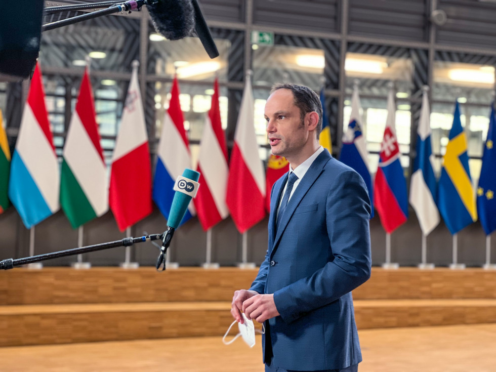 Minister dr. Anže Logar in front of the microphone for a press statement