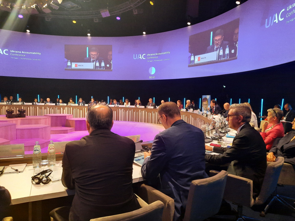 hall, participants sitting, among them State Secretary Štucin