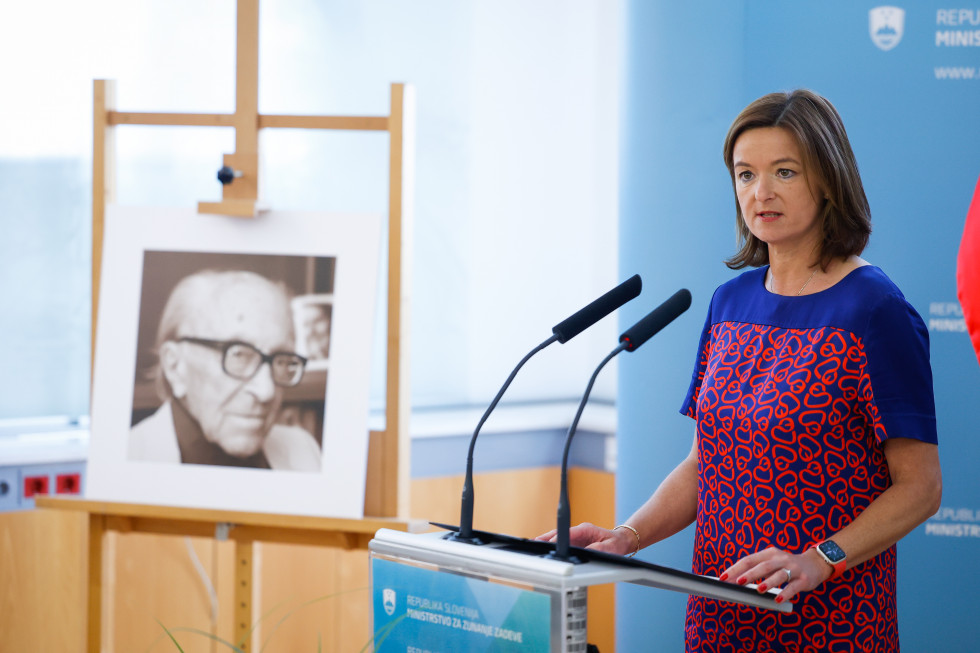 Minister Fajon during her speech, behind the speaker's podium