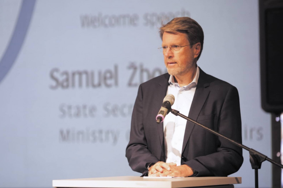 Samuel Žbogar behind the speaker's podium