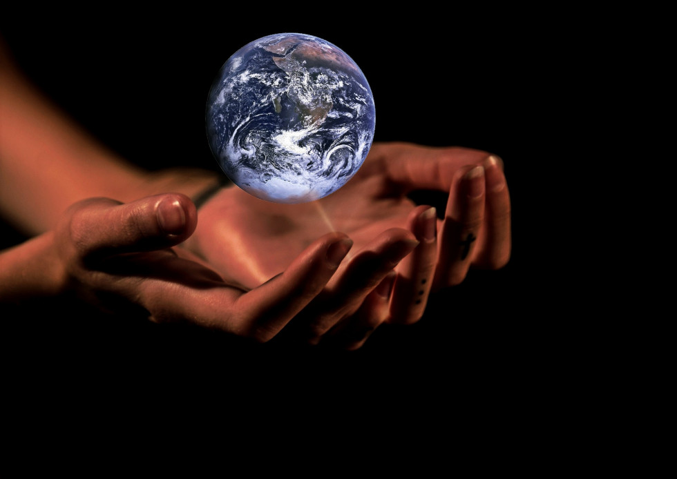 hands holding earth globe