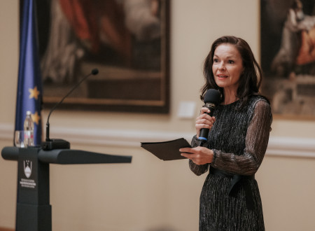 Addressing the audience.