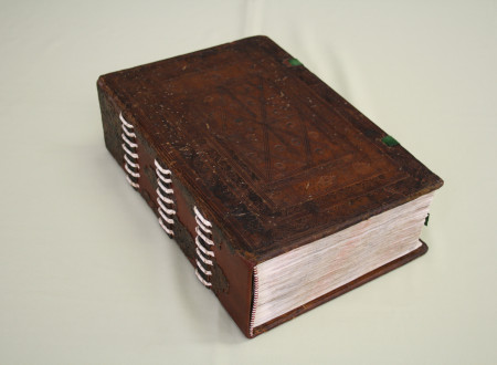 A leather-bound book.