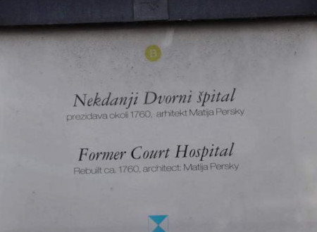 Label hinting at the Former Court Hospital Building in Ljubljana.