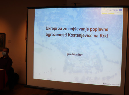 Platno z naslovom predstavitve Ukrepi za zmanjšanje poplavne ogroženosti Kostanjevice na Krki