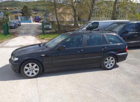 leva stran osebnega vozila BMW 320 D