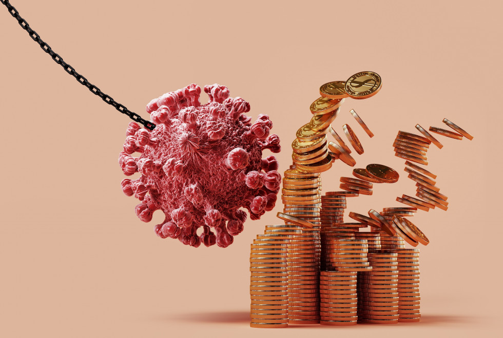 Simbolična fotografija prikazuje, kako virus ruši kovance