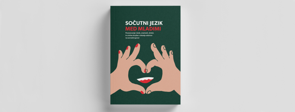 Zelena naslovnica monografije, na kateri sta narisani roki, ki s prsti oblikujeta simbol srca, znotraj katerega so odprta usta, nad sliko pa je napisan naslov monografije