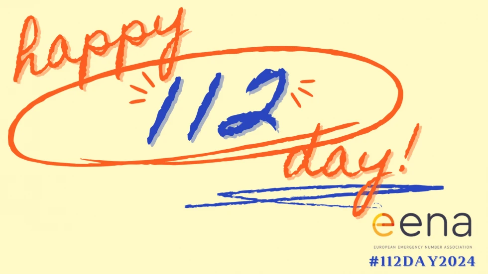 V oranžni barvi v angleškem jeziku piše vesel dan, z modro barvo 112, ki je obkrožena z oranžno barvo.
