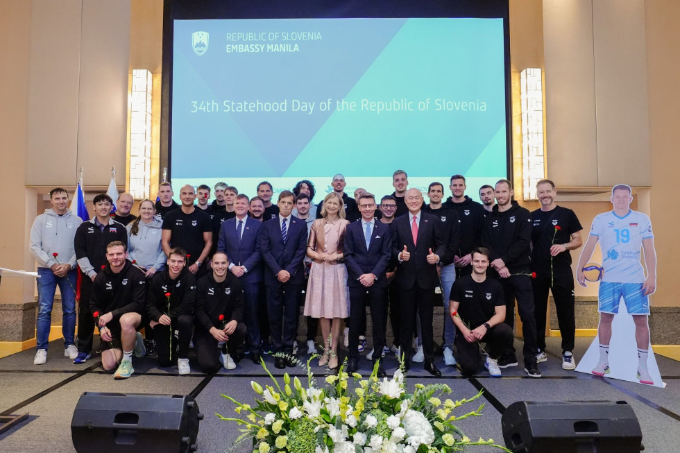 The Slovenian National Voleyball Team and the Embassy staff celebrate the Slovenian National Day
