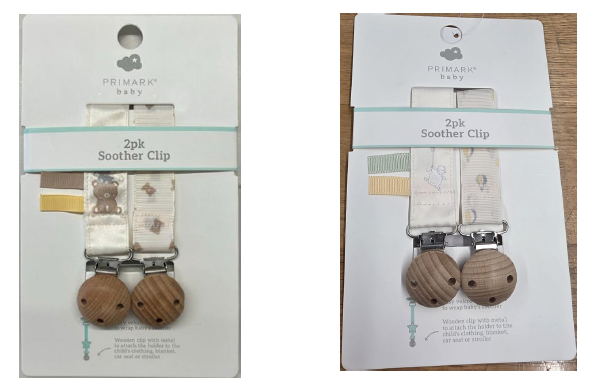 Dva kompleta držal za dude. v vsakem kompletu sta dva kosa. Na enem kompletu so na vrvici narisani medvedi, na drugem kompletu pa baloni. Sponka na vrvici je lesena.