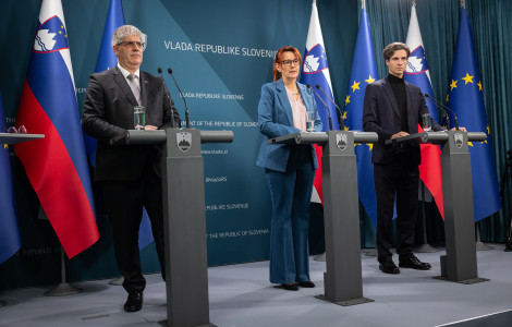 20251106 01485171 (three persons standing on stage behind the microphones)