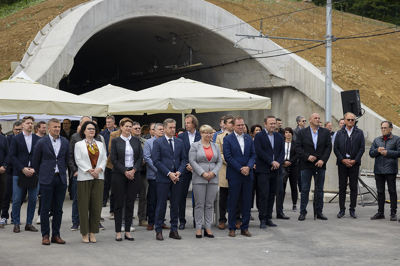 People gathered for the ceremony in front of the tunnel