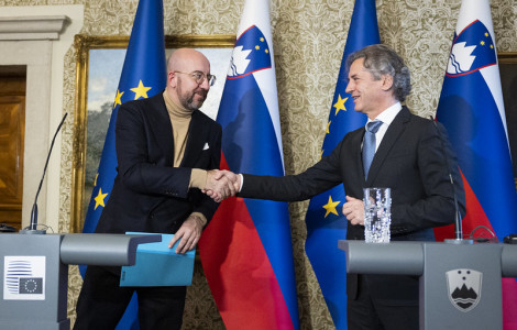 52544406606 c50471c54a c (European Council President Charles Michel and Prime Minister Robert Golob shake hands at the lectern in front of the flags)