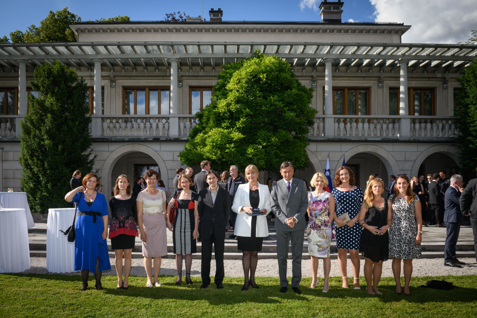 Borut Pahor with the employees of the government call centre.