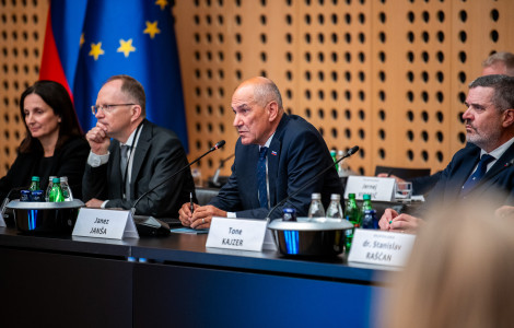 55491217890 e0d3c07f23 o (Panel of officials at a formal meeting with microphones; EU flag in background and nameplate Janez Janša on the table.)