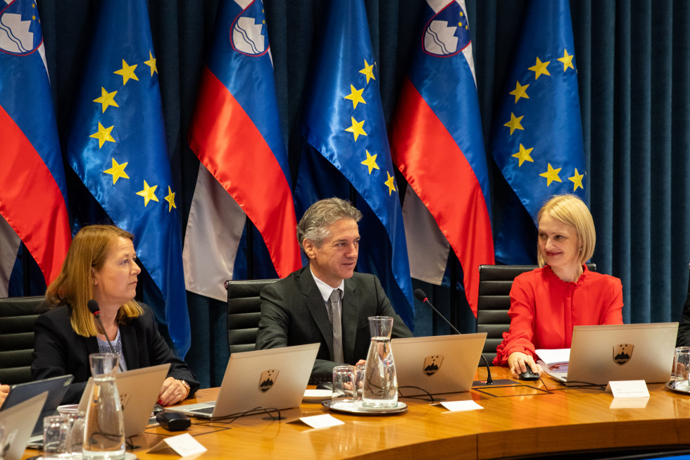 Prime Minister sitting behind the desk at the government session