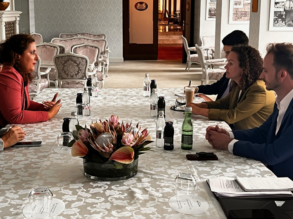 Director of Government Communication Office and representatives of the U.S. Secretary of State for Public Diplomacy at the table