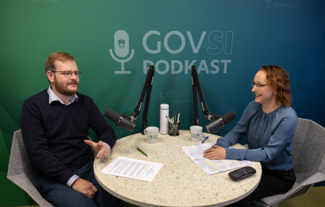 UKLS2539 (Copilot said:  A man and a woman sit at a round table with microphones, looking directly into the camera.)