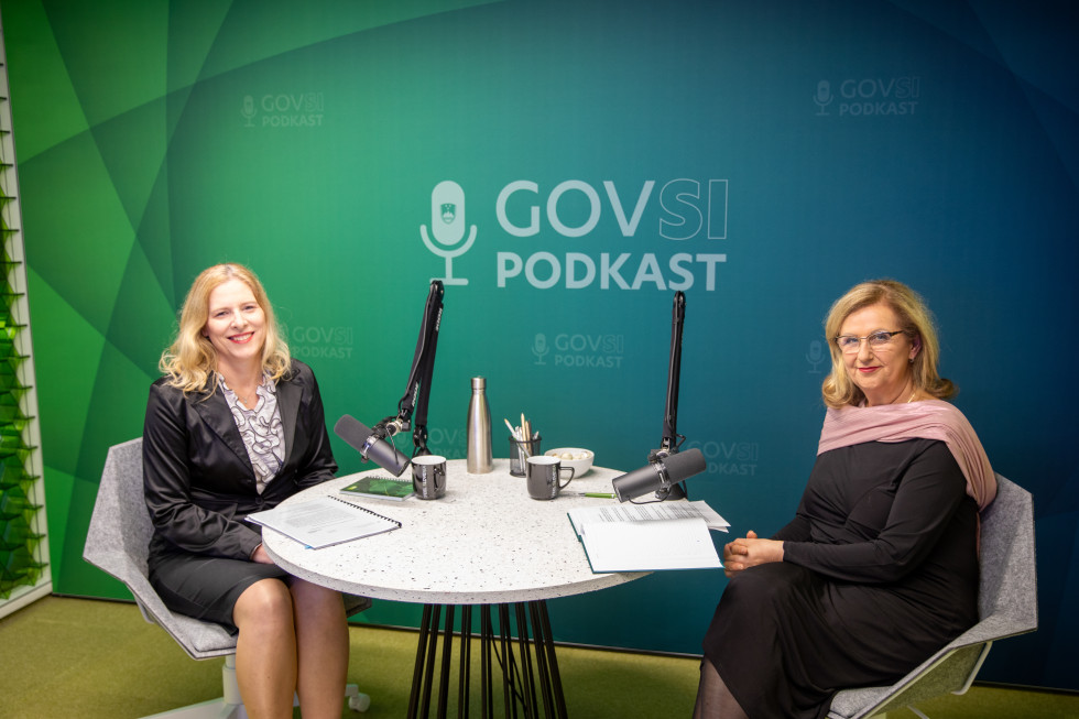 Janja Zupančič and Vesna Žarkovič sitting at the table with microphones on it.