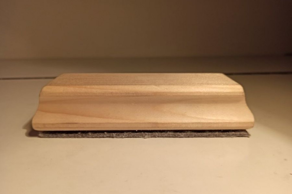 Wooden whiteboard wiper.
