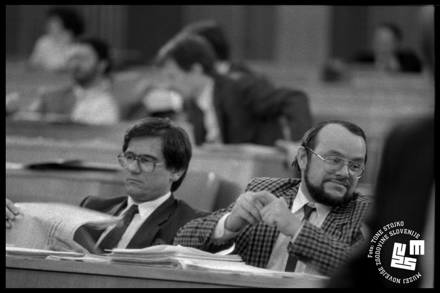 Rajko Pirnat and Anton Tomažič sit in the Assembly.